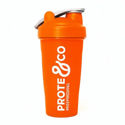 Shaker naranj Prote&Co 600ml libre de BPA con mezclador metálico para batidos